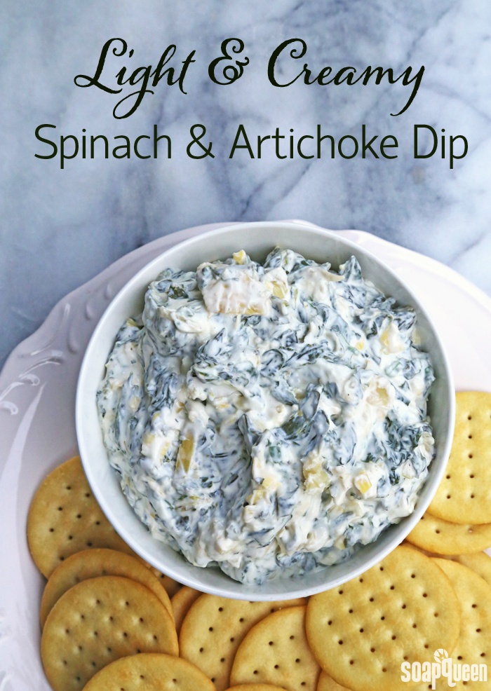 Made with fresh spinach, light Greek yogurt and light cream cheese, this Spinach and Artichoke Dip is always a hit at parties and gatherings!