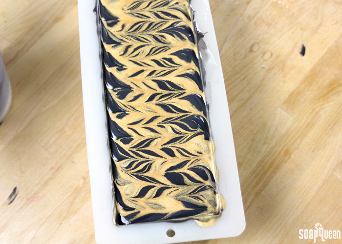 Mica painting is a great way to add color and sparkle to cold process soap. Learn how in this blog post!