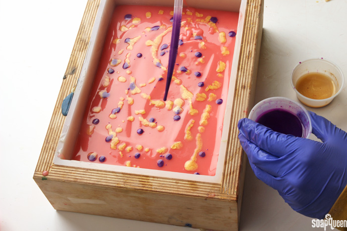 Mica painting is a great way to add color and sparkle to cold process soap. Learn how in this blog post!