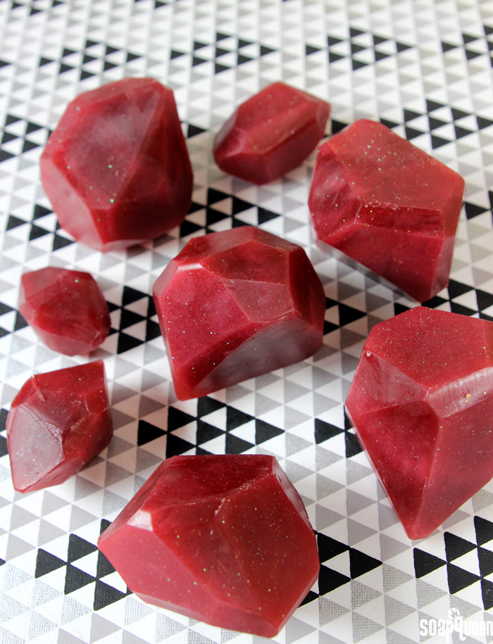 These Garnet Soap Gems are made with melt and pour soap and plenty of glitter. They make great holiday gifts, and are extremely easy to make!