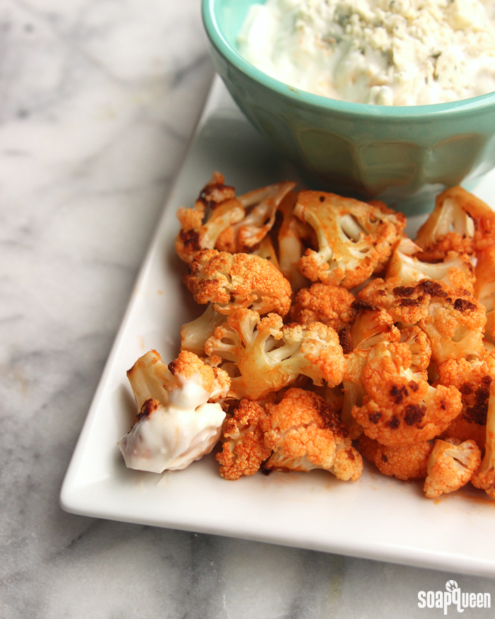 These Baked Cauliflower Buffalo "Wings" are a healthy alternative to the popular appetizer.