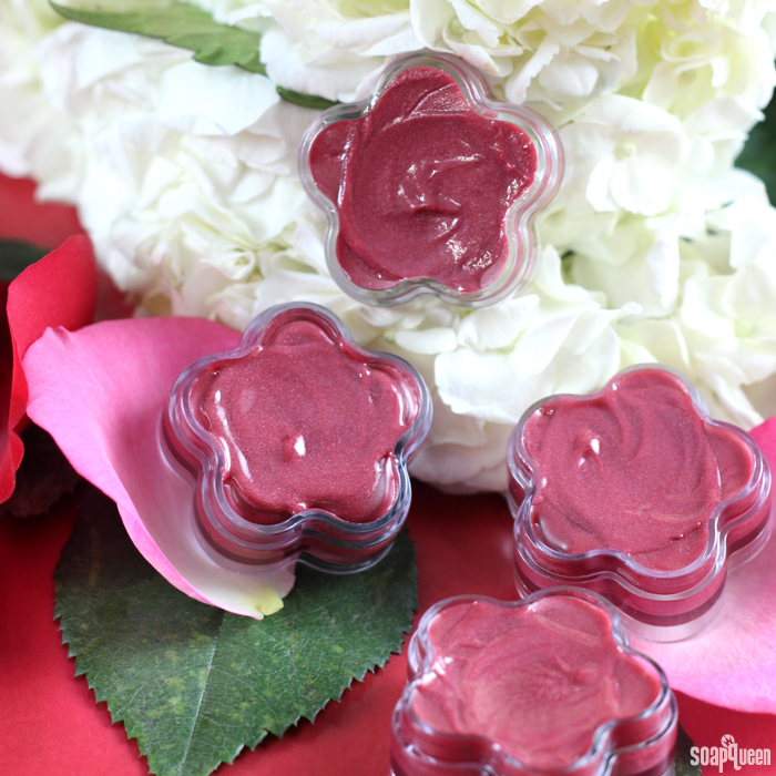 This Rosy Red Lip Gloss is made with jojoba oil and castor oil to create a luxurious, glossy product.