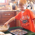 Jamisen is helping with Quinoa Stuffing Muffins