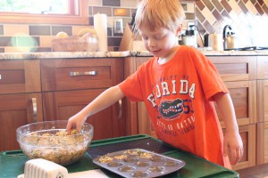 Jamisen is helping with Quinoa Stuffing Muffins