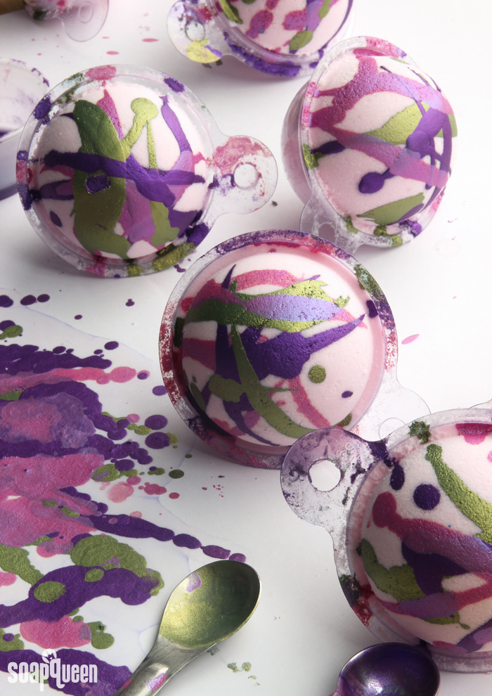 Painted Berry Bath Bomb DIY. These bath bombs are "painted" with a mixture of mica and alcohol for a fun splatter effect.