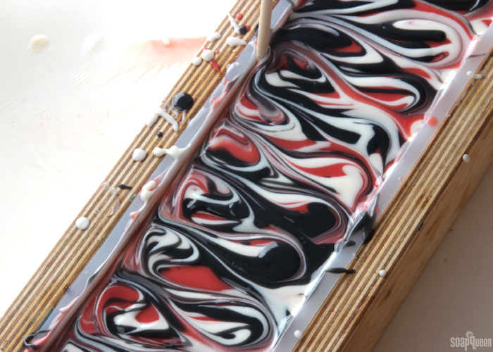 Red Hanger Swirl Cold Process Soap Tutorial // Learn how to create this bold and dramatic soap!