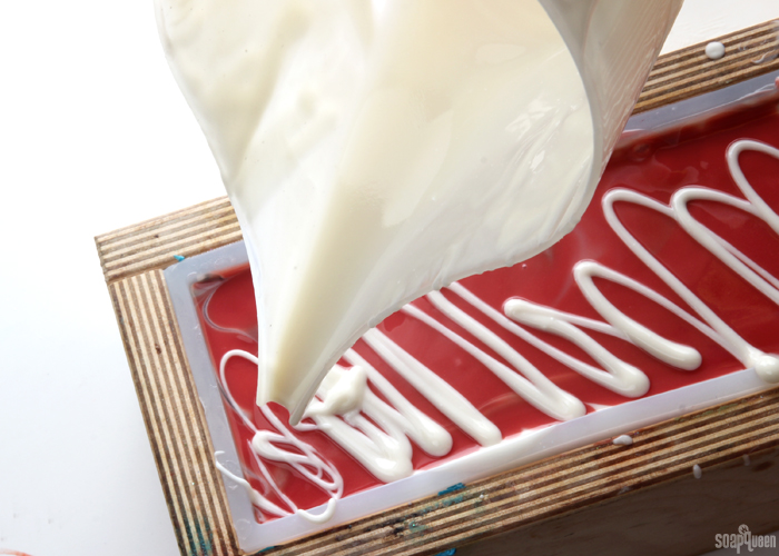 Red Hanger Swirl Cold Process Soap Tutorial // Learn how to create this bold and dramatic soap!